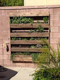Build the big wooden box to hold the herb planters, to build this fantastic mini herb garden! Pin By Francesco Manzoni On I Garden Outdoor Herb Garden Balcony Herb Gardens Herb Garden Wall