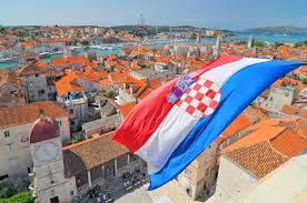 It is to the east side of the adriatic sea, to the east of italy. Croatia