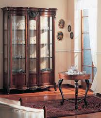 This display cabinet has a smooth surface with metal handles, and the design of the glass door makes the overall look more beautiful, which can complement your home decoration. Hand Decorated Display Cabinet For Dining Room Idfdesign