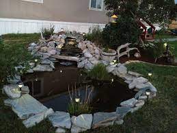 Pin By Jessica Dufeu On Outdoor Yard Garden Pond Design Fish Pond Gardens Pond Design