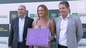 Casi tanto como su innovadora técnica en el salto de altura. Comite Olimpico Do Brasil