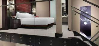 In the dining room area, there's a table for 4, and a closet with a stackable washer and dryer. Vdara Hotel Spa Las Vegas Honeymoons Honeymoon Dreams