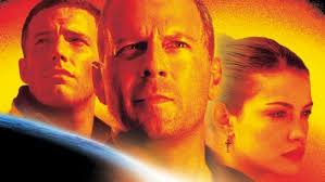 Bruce Willis Wears Original Armageddon Suit to Save Us