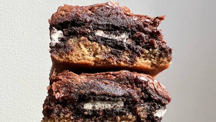 Slutty Brownies – gooey chocolate chip cookie dough, Oreos, and fudgy brownie layers stacked together