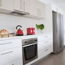White Maple Hpl Cabinets Make For A Simple Canvas Of A Kitchen Where You Bring The Color In Utensils Tow Kitchen Cabinet Trends Kitchen Cabinet Colors Kitchen