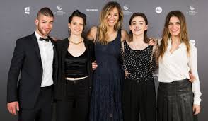 The us director appears in a black and white image, gazing up at some palm. Julia Ducournau La Semaine De La Critique Of Festival De Cannes