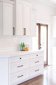 White Beveled Brick Tiles Create A Lustrous Backsplash Display Paired With White Quart Outdoor Kitchen Countertops Backsplash For White Cabinets Kitchen Design