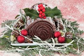 Check spelling or type a new query. Christmas Chocolate Yule Log Cake With Red Bauble Decorations Holly Mistletoe Snow Pine Cones And Winter Greenery Stock Photo Picture And Royalty Free Image Image 21845108