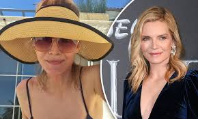 Michelle pfeiffer appeared in interview magazine looking as stunning as ever and pretty ethereal on the cover in particular. Michelle Pfeiffer Shows Off Her Flawless Skin In Swimsuit Selfie As She Soaks Up The Sun At La Home Daily Mail Online