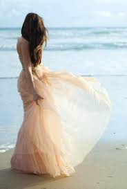 The high slit on the skirt of the wedding dress, which deliberately exposes the leg is a novelty of bridal fashion 2016. 68 Beautiful And Relaxed Beach Wedding Dresses Weddingomania