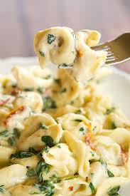 Birds Eye Veggie Made Mac And Cheese Shells Tortellini In Parmesan Cream Sauce With Spinach And Sun Dried Tomatoes Brown Eyed Baker Recipe Tortellini Recipes Recipes Cooking Recipes
