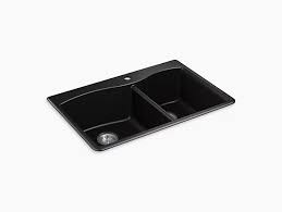 Made of stainless steel, it measures 22 x 33 x 9 (55.88 x 83.82 x 22.86 cm) and is divided in two sinks, namely a larger and a smaller one. Kennon 33 Neoroc Top Undermount Single Bowl Kitchen Sink K 8437 1 Kohler Kohler