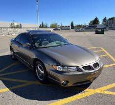 Image result for Dark Bronzemist 2001 Pontiac