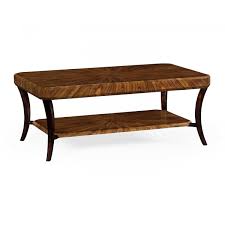 This table has a rounded silhouette with a white faux marble surface that measures 33 wide, so it easily displays a framed photo, small lamp, or an accent piece. Luxury Art Deco Coffee Table High Lustre Swanky Interiors