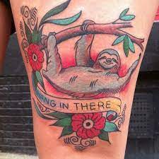 Pin By Alyssa Galella On Traditional Tattoos Sloth Tattoo Traditional Tattoo Lioness Tattoo Design