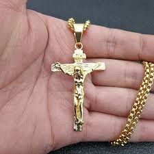 This necklace is made from durable and hypoallergenic stainless steel and includes a matching chain. Gold Jesus Cross Necklace For Men Stainless Steel Cross Pendant Gold Chains For Men Chains For Men