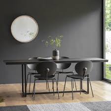 The wood's live edge that follows the natural shape of the tree increases the beauty of the table. Black Novato Rectangle Dining Table 200cm Modern Dining Tables
