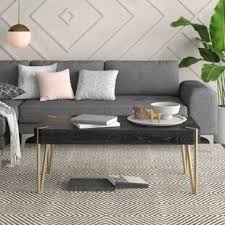 The ultra coffee table is a modern octagonal coffee table that has a rectangular shape and a lower shelf. Octagon Coffee Table Wayfair