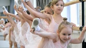 Best stretching exercises for better flexibility. Group Of Little Girls In Pink Leotards And Tutu Skirts Doing Leg Stretching Exercises By Ballet Barre In Dance Studio Stock Video Footage Storyblocks