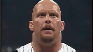 Kane douses "Stone Cold" Steve Austin in a dark liquid