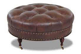 A good coffee table is a key component of any living room, but an ottoman coffee table takes style to a new level. Angelo 37 Inch Round Tufted Coffee Table Leather Ottoman