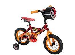 The Disney Cars 12 Inch Bike Is Red With Distressed Black In Color Rear Coaster Brakes Padded Seat And Crossbar Removable Kids Bike Boy Bike Disney Pixar Cars