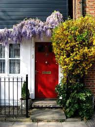 A Wisteria Vine Covered Trellis Capital Landscape Recommended Plants For Sacramento S Zone 9 Painted Exterior Doors Red Front Door Exterior Doors