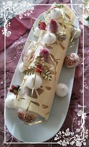 Buche Glacee Vanille Bourbon Coeur De Meringue Framboises Ou Litchis Ses Meringuettes Sous Une Cage De Chocolat Buche Glacee Chocolat Blanc Vanille Bourbon