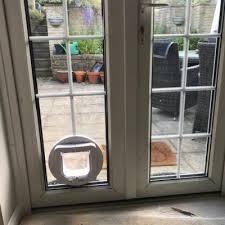 Pet door guys limited warranty guarantees it will repair or replace any pet door guys product which is found to be defective in material or workmanship and will pay the costs of repair or replacement to the original owner for a period of 10 years. Cat Flap Fitter Dog Door Specialists Cat Out Of Glass