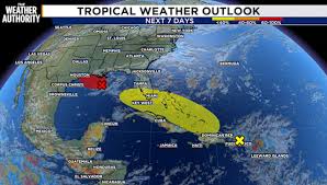 Remnants of Tropical Storm Dolly move toward the Gulf, threatening Florida with heavy rain and stronger storms; redevelopment chance low at 20%