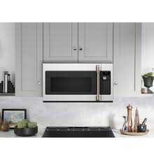 Equipped with the exclusive broan captur system which combines advanced blower design with new filter technology this 300 cfm. Cafe 1 7 Cu Ft Convection Over The Range Microwave Oven Cvm517p4mw2 Cafe Appliances