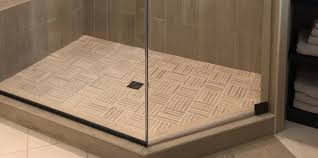 In these types of showers a curb is built up at the entry/exit point sand mix for shower pans is meant to be used as a dry pack so the proper consistency is much like a snowball. Shower Pans Tile Vs Solid Surface Select Kitchen And Bath