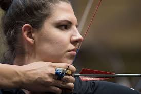 Army Spc. Sydney Davis competes in archery during the