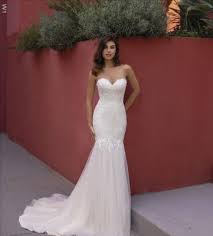 Choose a white or colored wedding dress. White One Elite Bridal