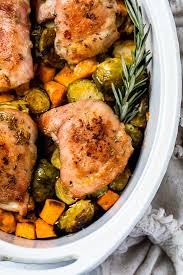 One Pot Baked Chicken Thighs With Brussels And Sweet Potato Recipe In 2020 Skinny Taste Recipes Baked Chicken Thighs Chicken Dinner