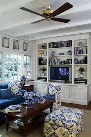 A Sun Room Blue Couch Living Room Blue Living Room White Family Rooms