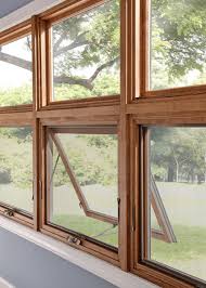 Wood Windows Are The Top Choice For A Rustic Modern Look Using Essence Series Awning Windows House Window Design Window Design Door And Window Design