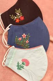An embroidery file, and the other is a dieline file marked with the letters . Hand Embroidered Face Masks Shopperboard