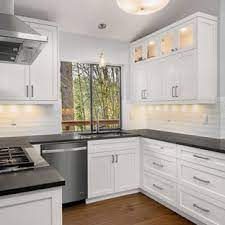 The initial step in installing your kitchen cabinet would be to make a mark on the wall where the cupboards are going to be adjoined. 75 Beautiful White Kitchen With Black Countertops Pictures Ideas August 2021 Houzz