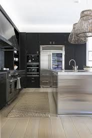 Tour An Apartment Inside Nyc S Luxury Celeb Filled Building Domino Interior Design Kitchen Steel Kitchen Cabinets Stainless Steel Kitchen Cabinets