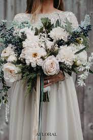 Check spelling or type a new query. Neutral Winter Wedding Bouquet With Silk Flowers And Artificial Holiday Greenery From Aflora Winter Bridal Bouquets Blush Winter Wedding Winter Wedding Bouquet