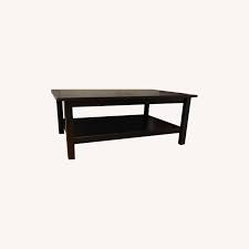 The sides are crafted from metal and finished in a black hue for a touch of industrial appeal, while the lower shelf provides a convenient. Ikea Lack Coffee Table Black Aptdeco