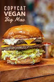 Impossible Double Cheeseburger Made With Two Impossible Foods Patties Vegan Cheese Lettuce Dill P Vegan Fast Food Vegan Cheeseburger Vegan Patties