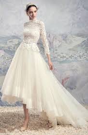 A higher hem at the front and a dip hem to the back. High Lo Bridals Dress Hi Low Wedding Dresses June Bridals