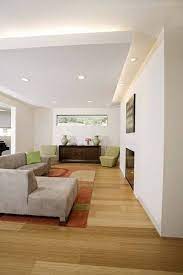 Living Room With Ceiling Indirect Light Fixtures And Electric Fireplace And Sectiona False Ceiling Bedroom False Ceiling Living Room Ceiling Design Living Room