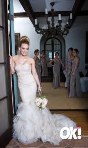 Hilary duff married matthew koma wearing a custom jenny packham wedding dress with bold shoulders, cape sleeves and plenty of sentimental details. Hilary Duff Wedding Dresses Fashion Dresses