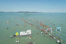 The most popular beach and resort area in hungary, the huge freshwater lake and it's surrounding is a perfect place to relax. Thousands Dive Into Balmy Lake Balaton In Hungary For Swimming Contest Reuters