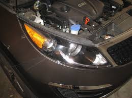 Locate the two bolts on the top of the assembly and remove them with your. 2014 Kia Sportage Headlight Assembly Changing Low Beam Flickr