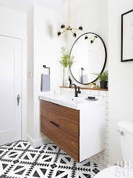 modern bathroom with round mirror and