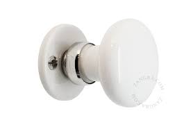 While I Love Brass There S Something Gorgeous About White Porcelain Also Check Out The Light Bulbs At Zangra Zangra Door Handles Window Handles Porcelain